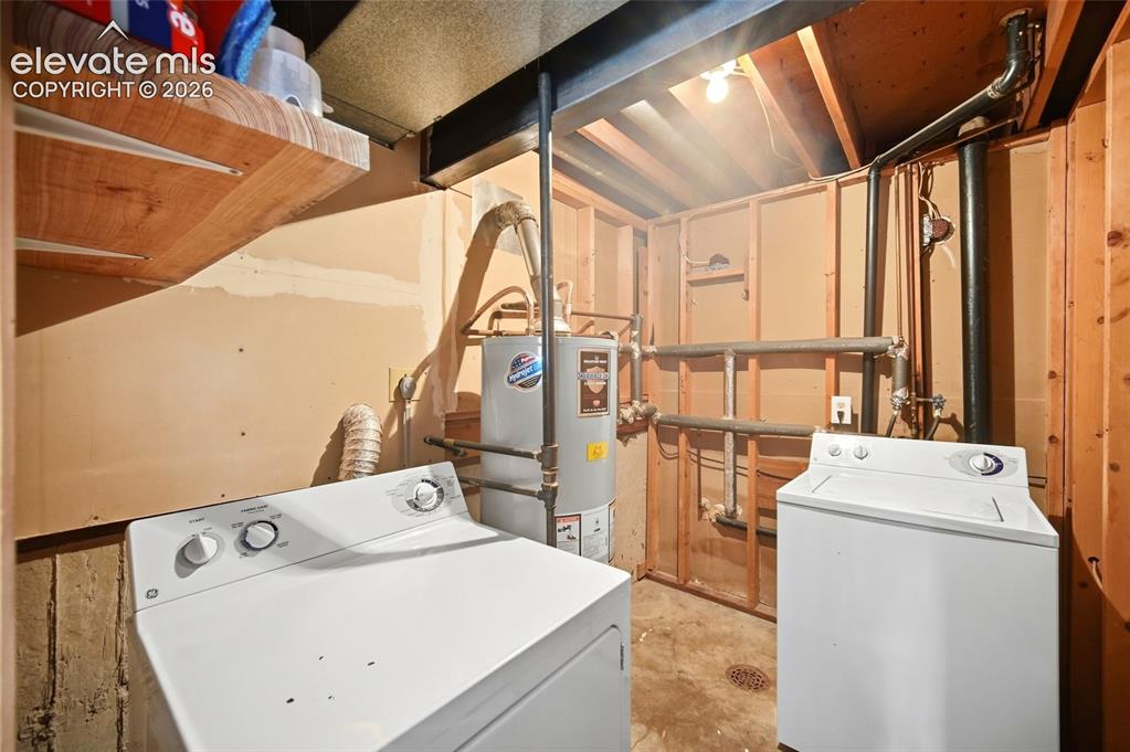 Image 31 of 39: Lower level unfinished laundry room