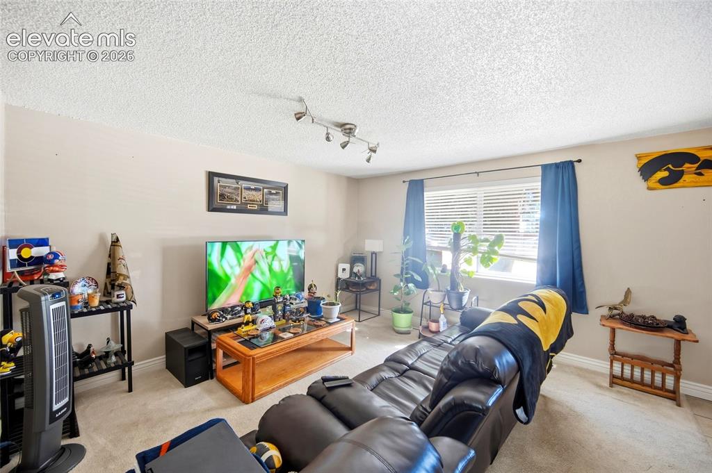 Image 8 of 39: Main level living room