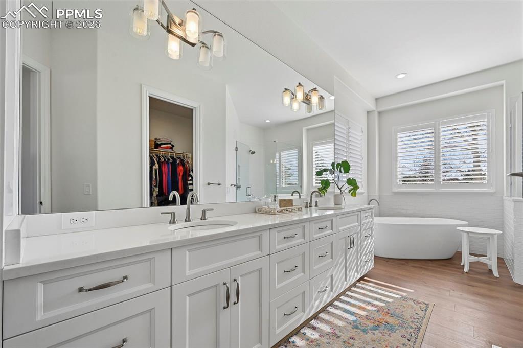 Image 25 of 50: Beautifully appointed primary bathroom