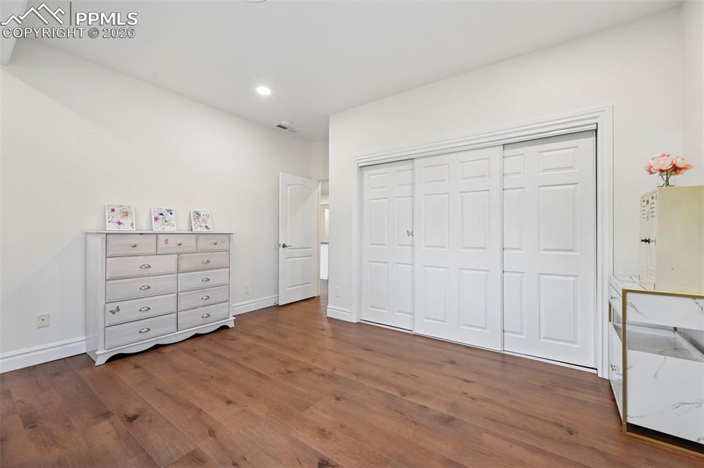 Image 36 of 50: Basement bedroom
