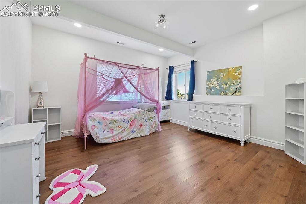 Image 37 of 50: Basement bedroom