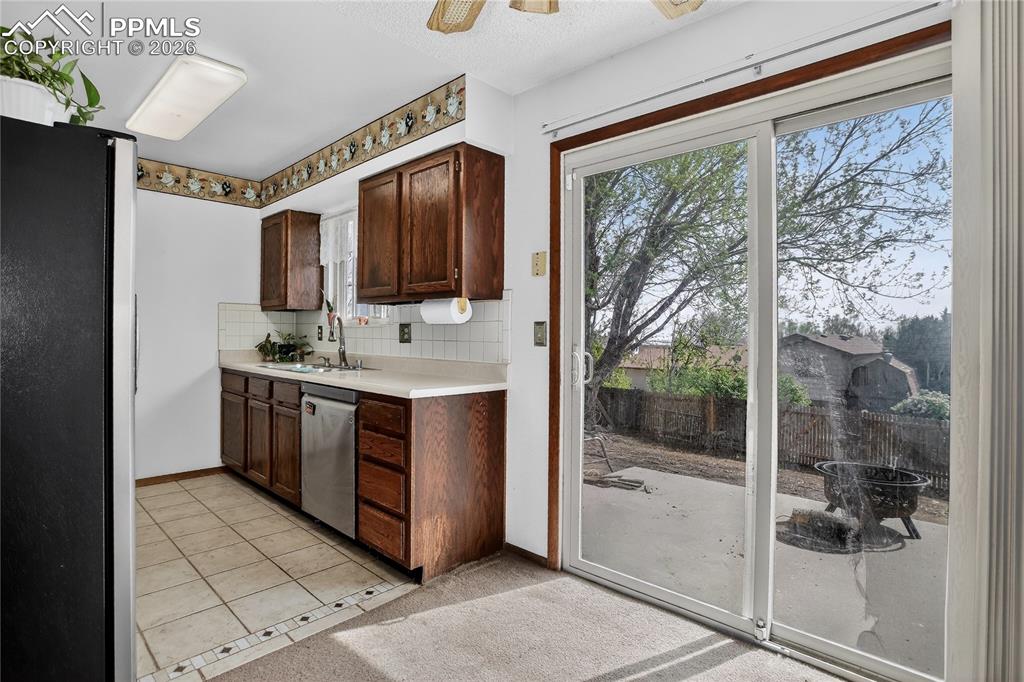 Image 5 of 17: Dining room adjacent to kitchen