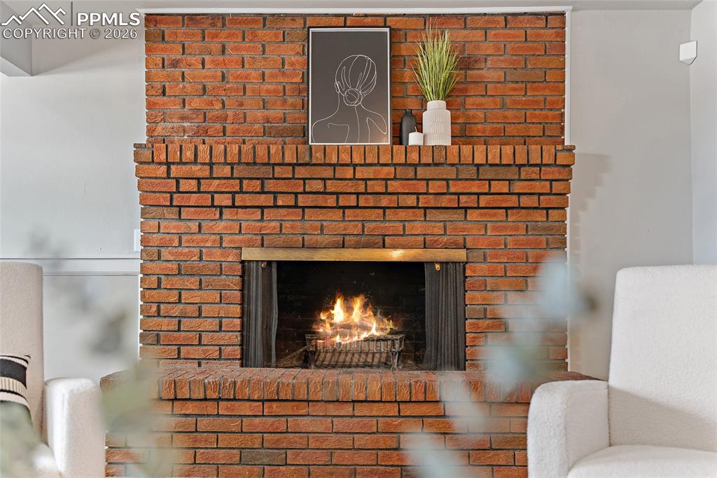 Image 35 of 38: Detailed view of a fireplace