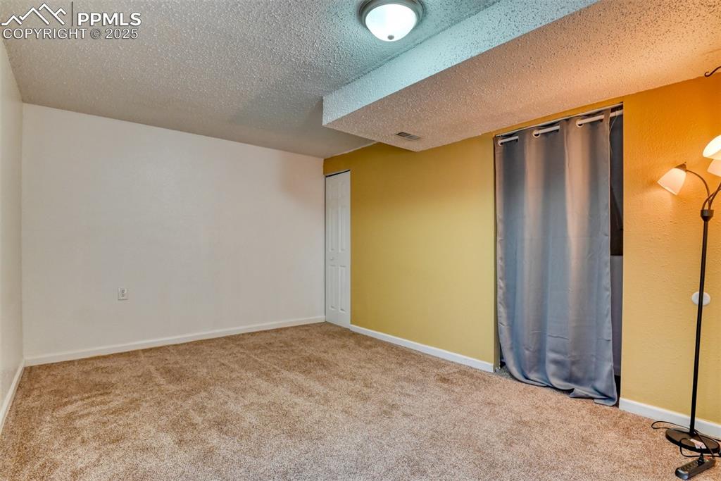 Image 18 of 38: Bedroom