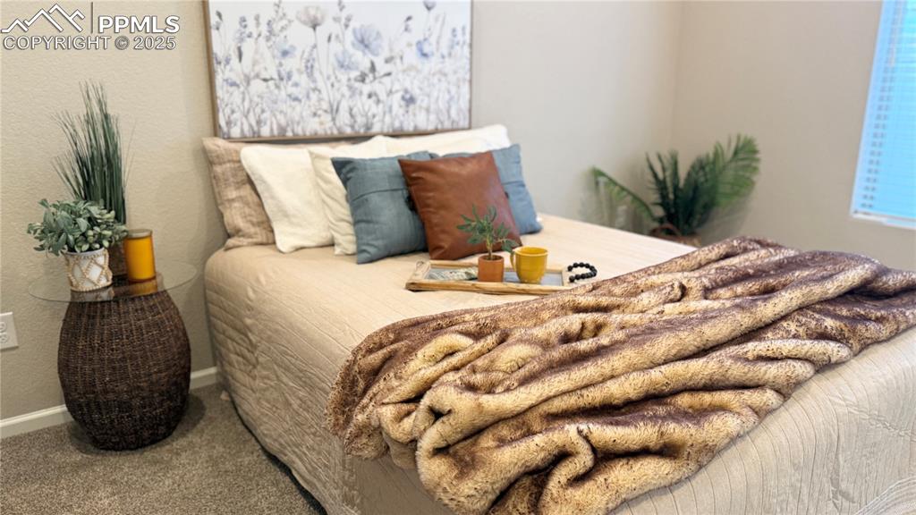 Image 15 of 41: shown with queen sized bed. very roomy