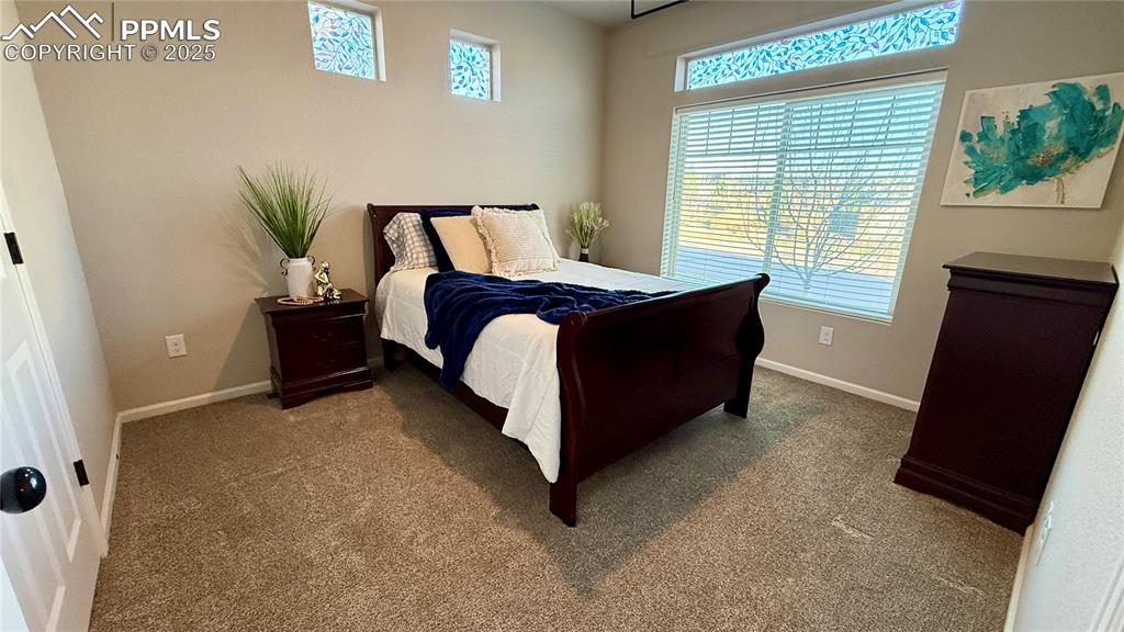 Image 22 of 41: secondary bedroom on main floor