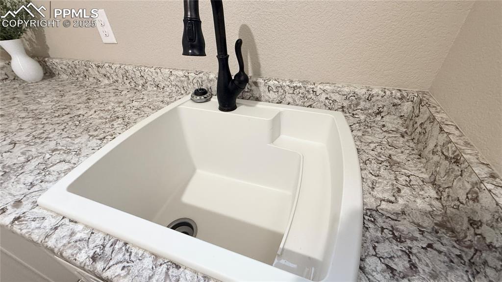 Image 25 of 41: extra deep laundry sink