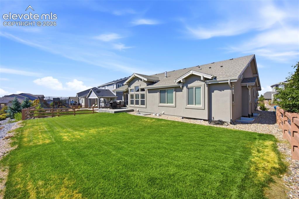 Image 39 of 45: Enjoy the fabulous and large back yard