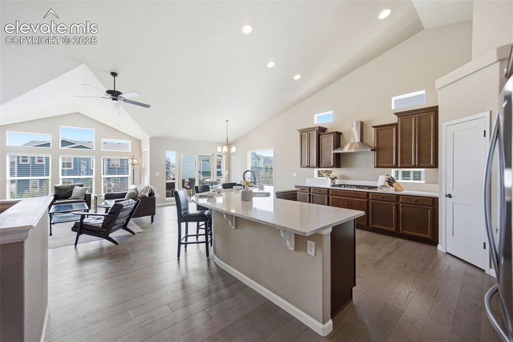 Image 4 of 45: Beautiful open floor plan with soaring ceilings, perfect for entertaining.