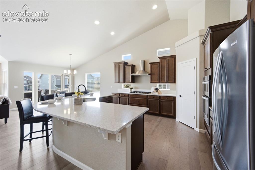 Image 5 of 45: Gorgeous kitchen with custom fit granite slab counters.