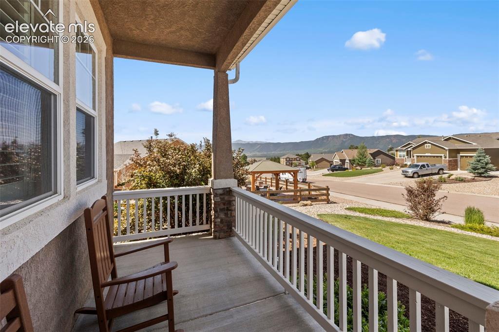 Image 3 of 50: Amazing views and sunlight from the covered front porch
