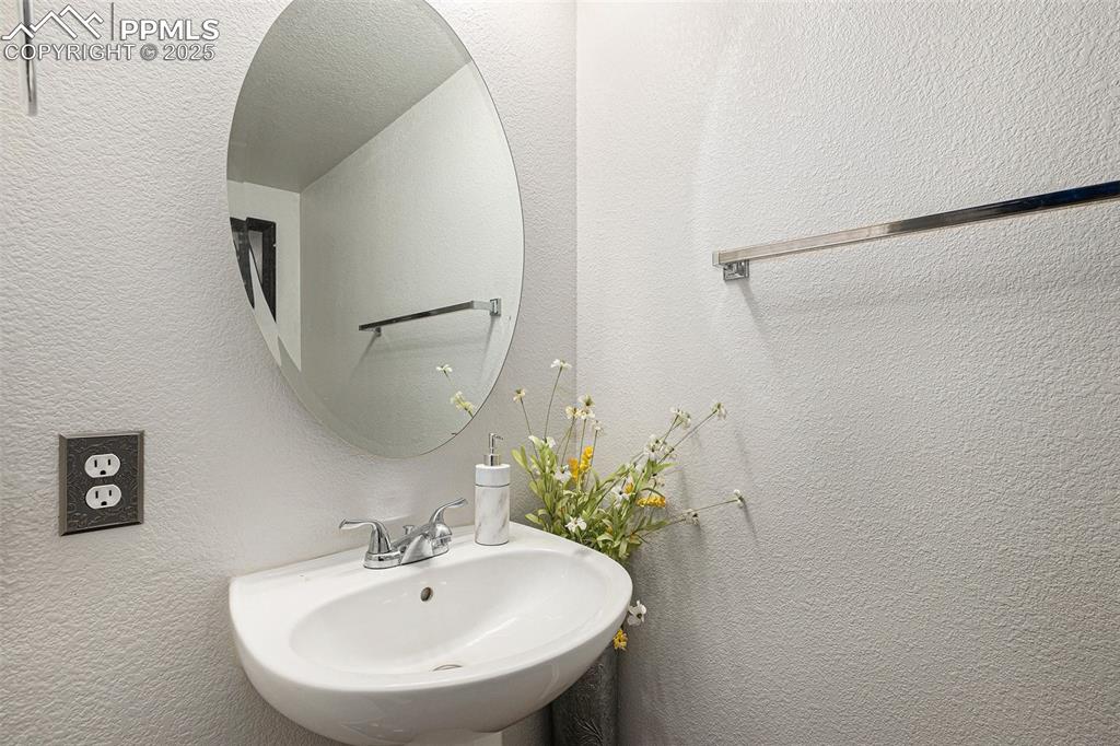 Image 15 of 21: Bathroom with a sink
