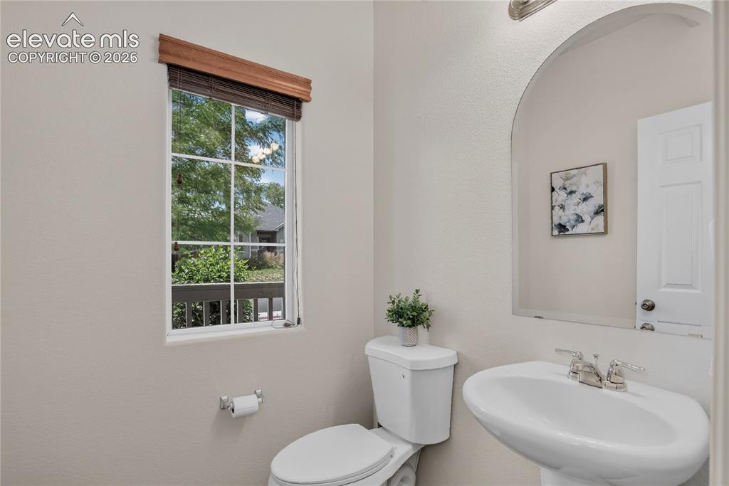 Image 11 of 23: Main level powder room