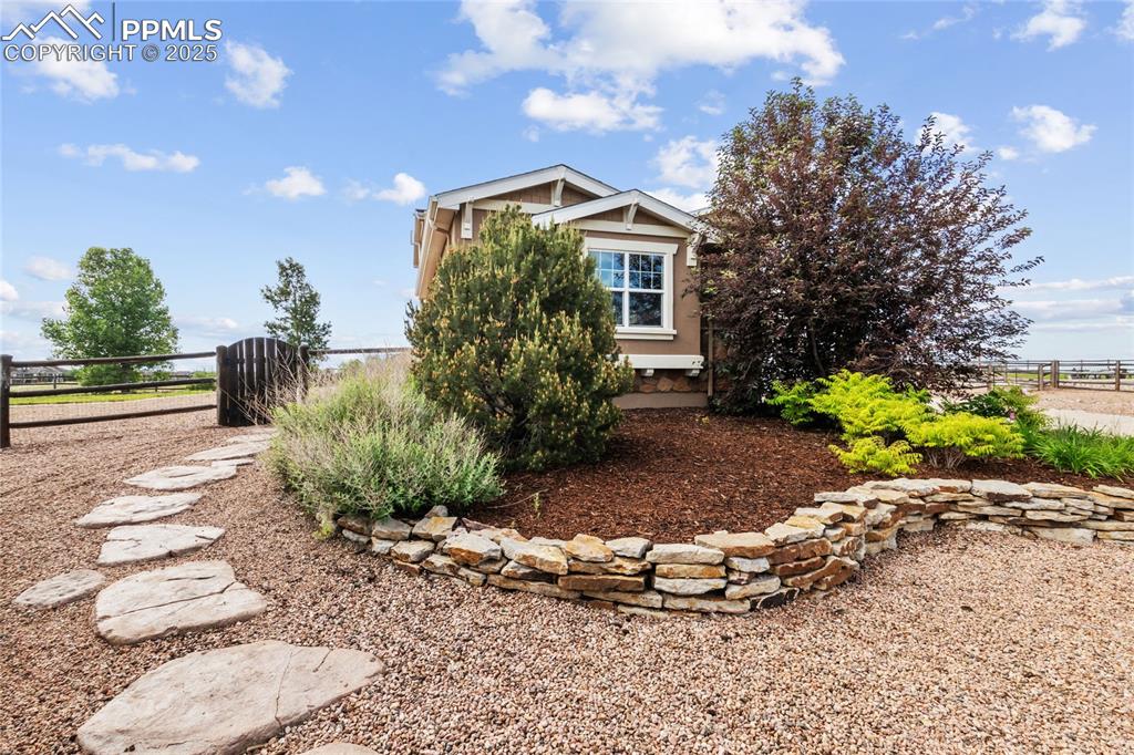 Image 2 of 36: View of front of property featuring stucco siding