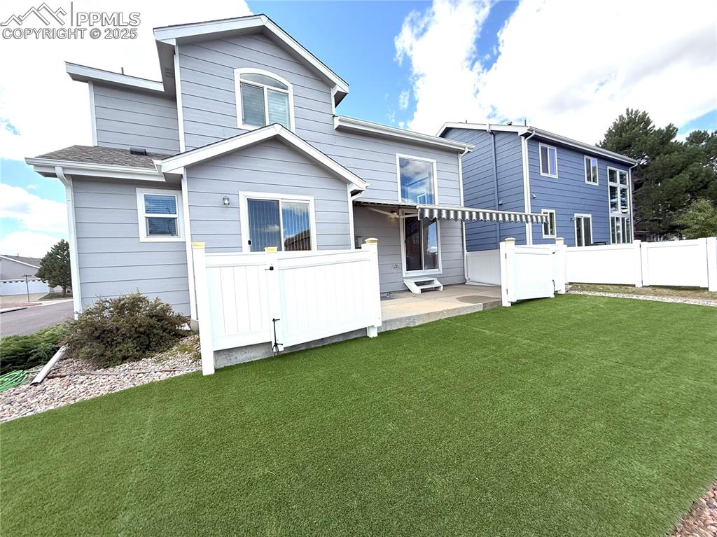 Image 34 of 47: Rear view of house