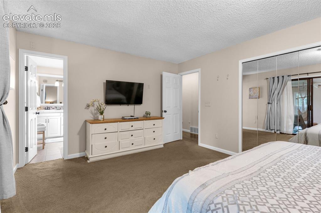 Image 16 of 39: Master Bedroom