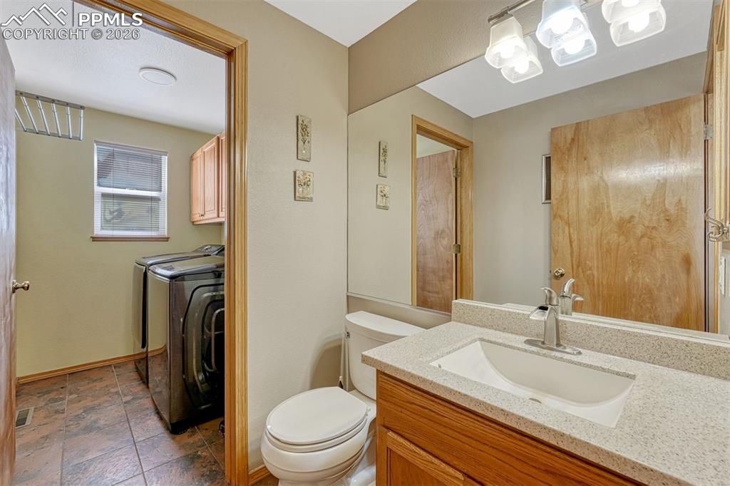 Image 18 of 40: Laundry room features ½ bath