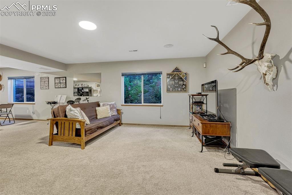 Image 29 of 40: Spacious lower level living space