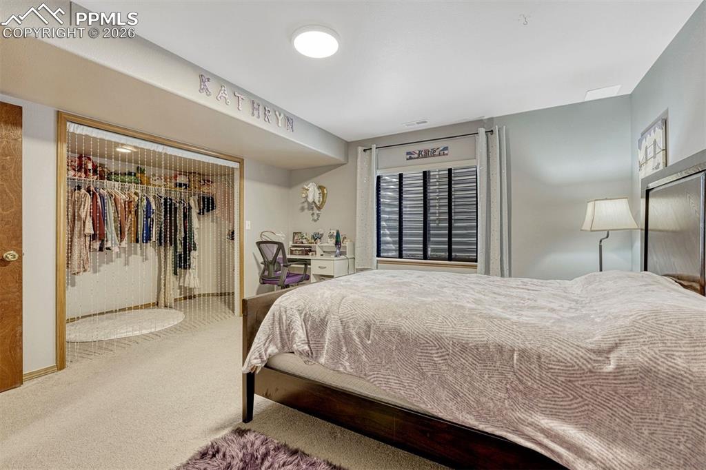 Image 34 of 40: Lower level 5th bedroom with large closet