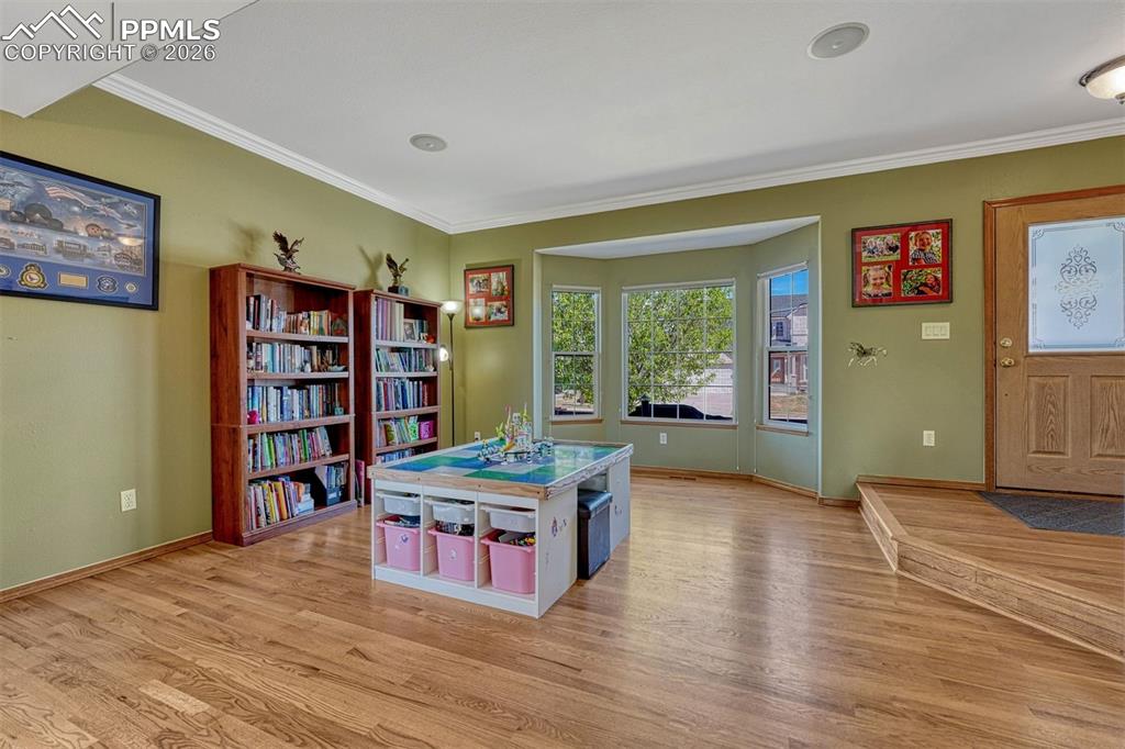 Image 6 of 40: Hardwood floor front living room