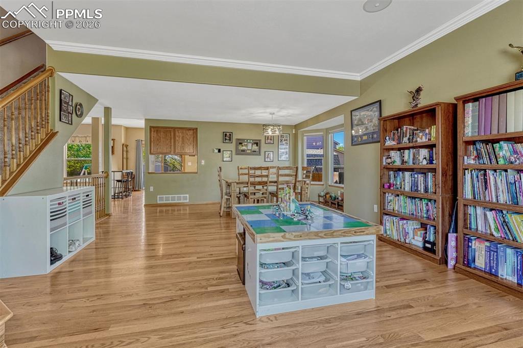 Image 7 of 40: Living room open to dining area