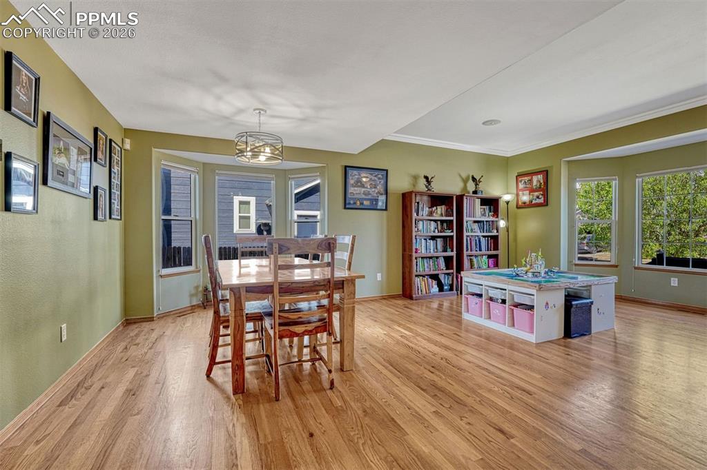 Image 8 of 40: Dining room open to living room