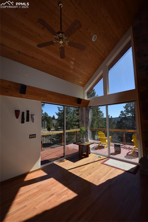 Image 11 of 44: Unfurnished sunroom with vaulted ceiling and healthy amount of natural ligh