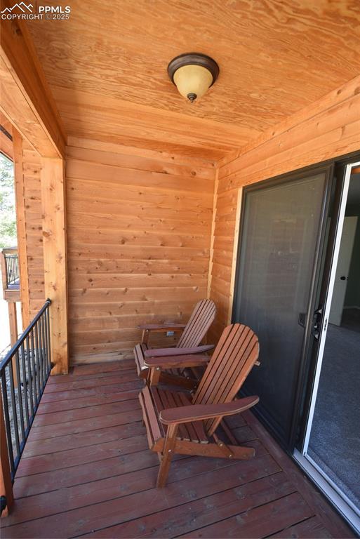 Image 25 of 44: Private Deck/view of wooden deck