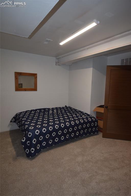 Image 31 of 44: Bedroom featuring carpet floors