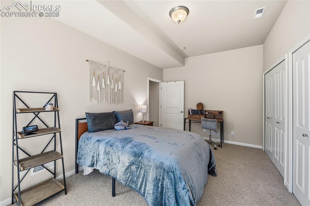 Image 38 of 49: Bedroom