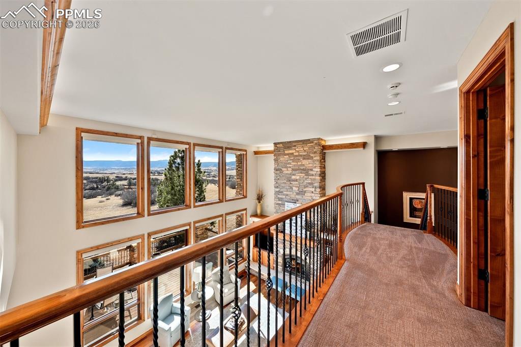 Image 27 of 40: Upper level overlook with sweeping mountain views and a dramatic vantage po