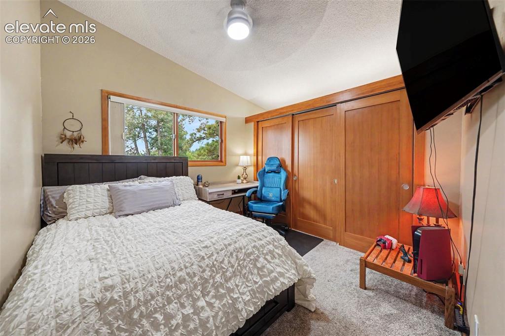 Image 17 of 30: Perfect for guests, family members, or a home office, the second bedroom of