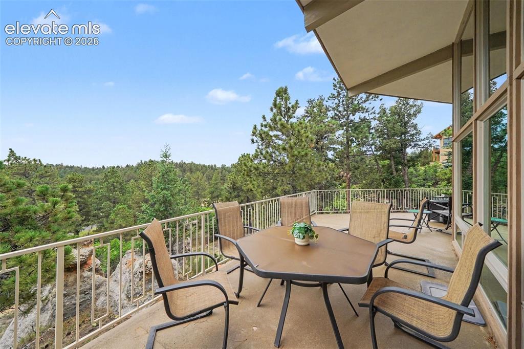 Image 21 of 30: Enjoy the outdoors from the expansive concrete deck offering plenty of spac