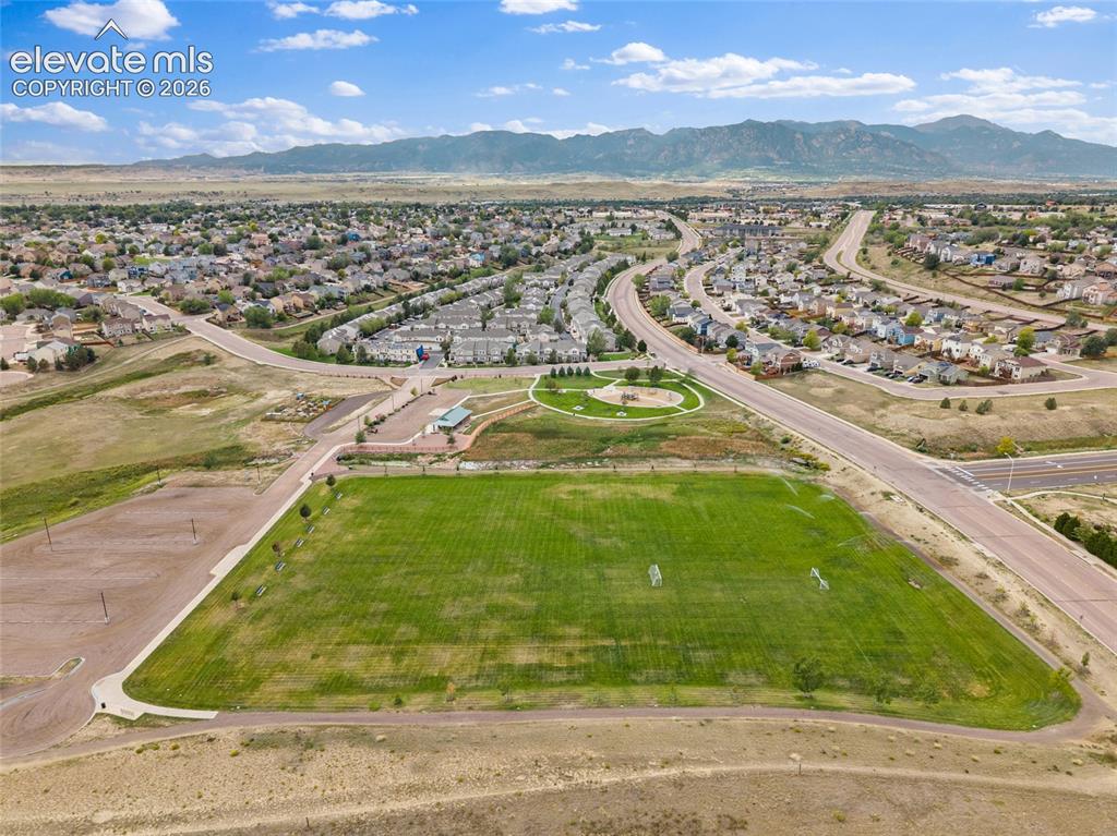 Image 36 of 41: Aerial view highlighting nearby Park, neighborhood streets, green space, an