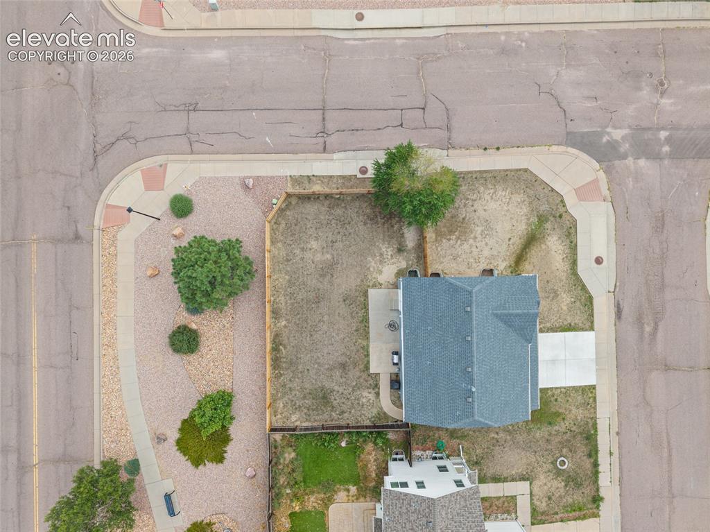 Image 38 of 41: Straight-down aerial view clearly showing the property footprint, corner lo