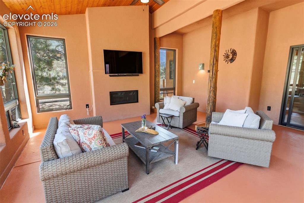 Image 14 of 39: Main Level Sun Room
