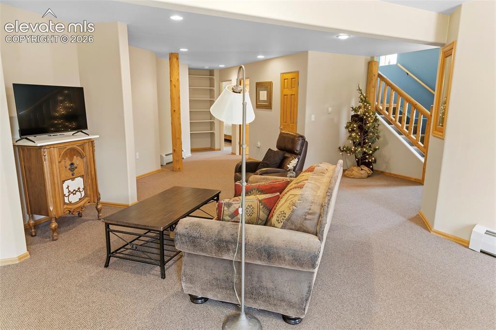 Image 30 of 39: Lower Level Family Room
