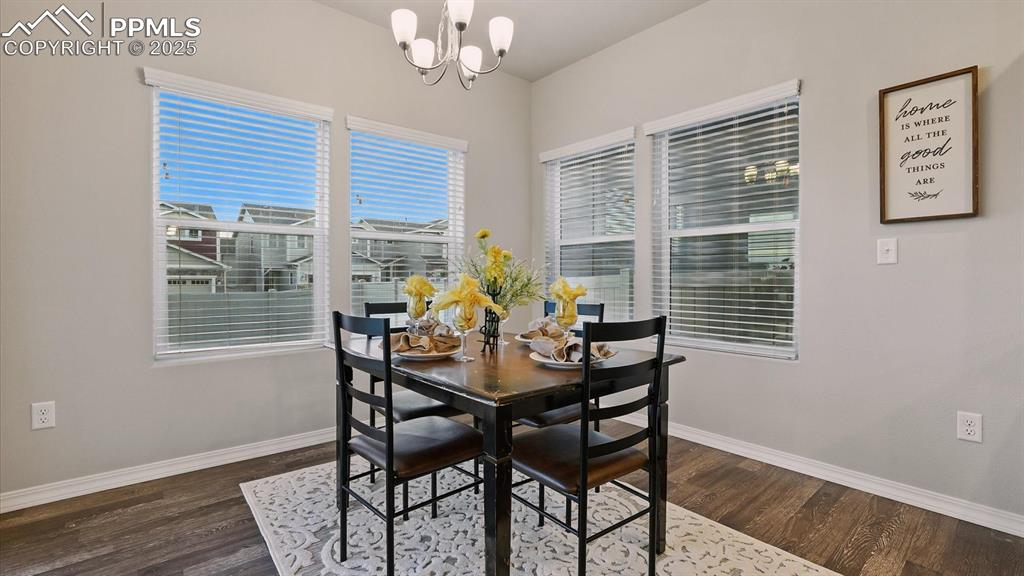 Image 12 of 47: Dining Area located off the Kitchen for easy food service and clean up.