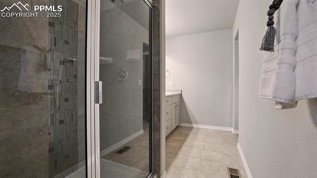 Image 31 of 47: Enclosed spa shower in the Primary Owner