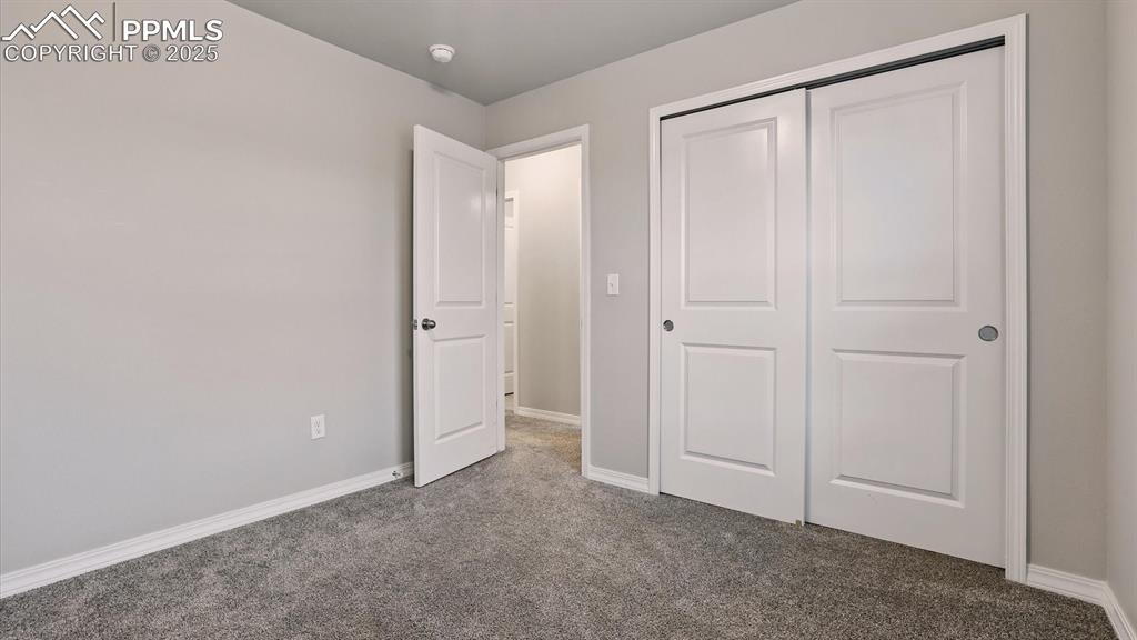Image 35 of 47: Upper Level Bedroom #3 with generous closet.