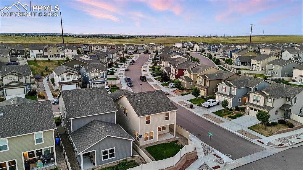 Image 44 of 47: Aerial view of backyard.