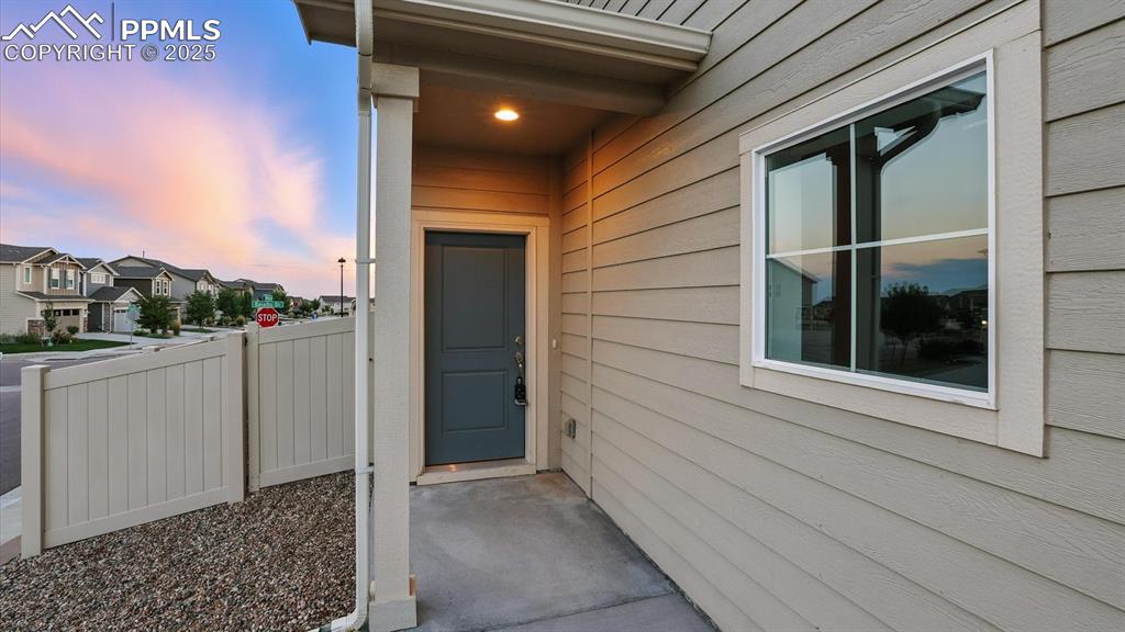 Image 6 of 47: Covered front entry.