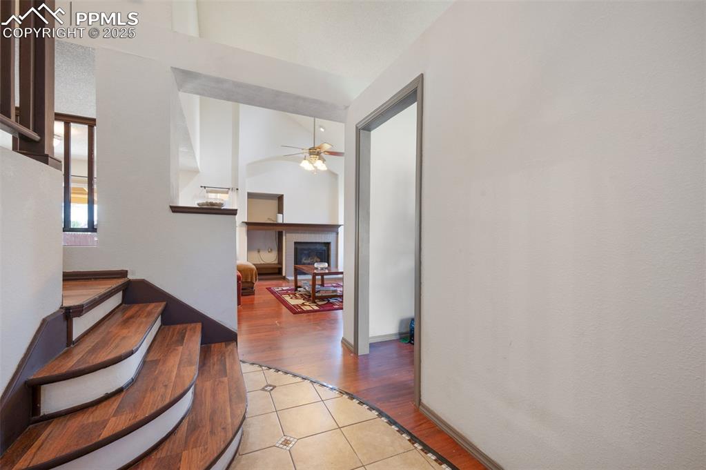 Image 7 of 50: Corridor featuring light tile patterned floors
