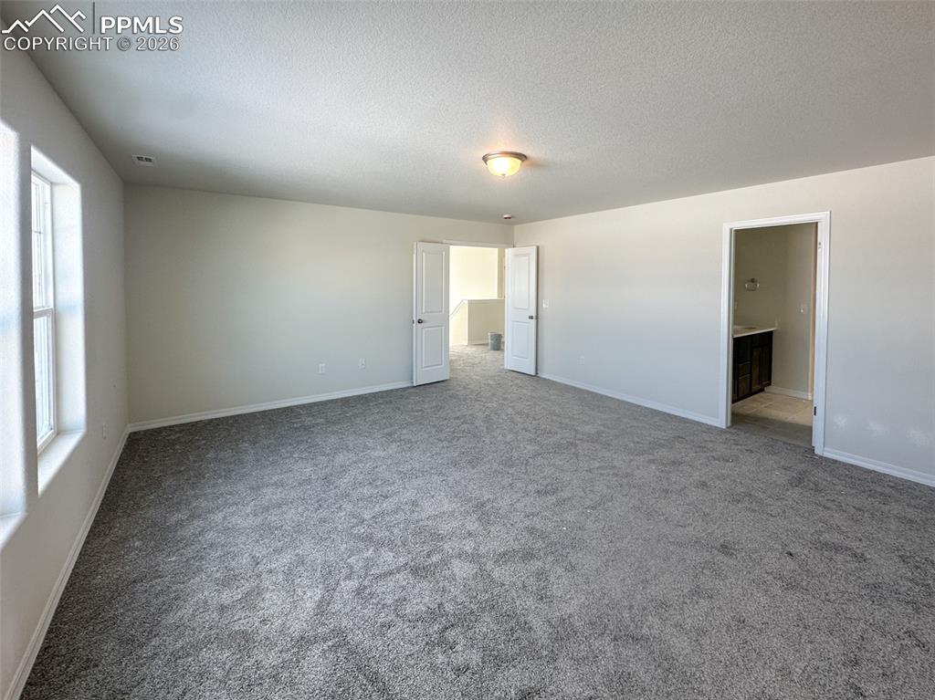 Image 14 of 29: Master Bedroom