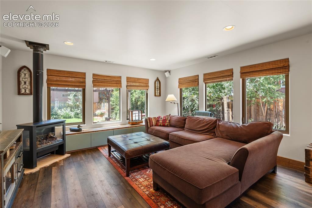 Image 17 of 38: Main house Family Room with gas fireplace