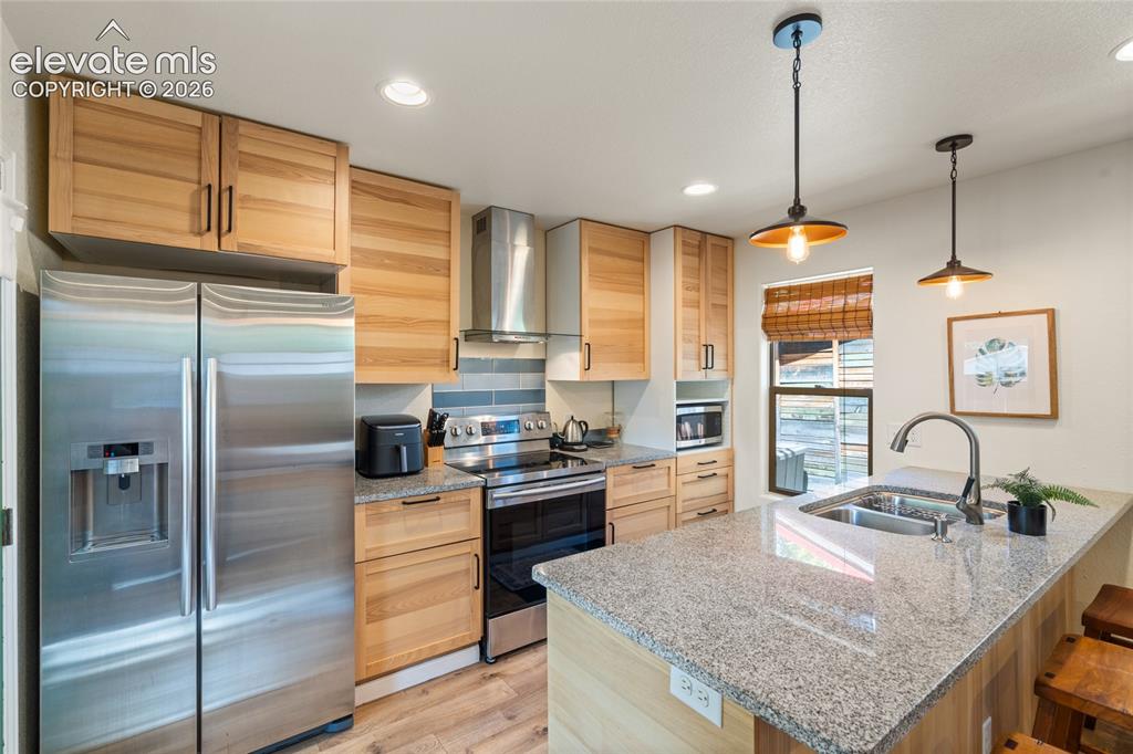 Image 25 of 38: ADU Kitchen with stainless appliances- including dishwasher!
