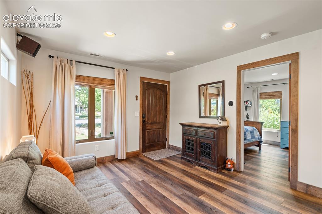 Image 6 of 38: Main house Living Room/Entry. View towards Guest Bedroom