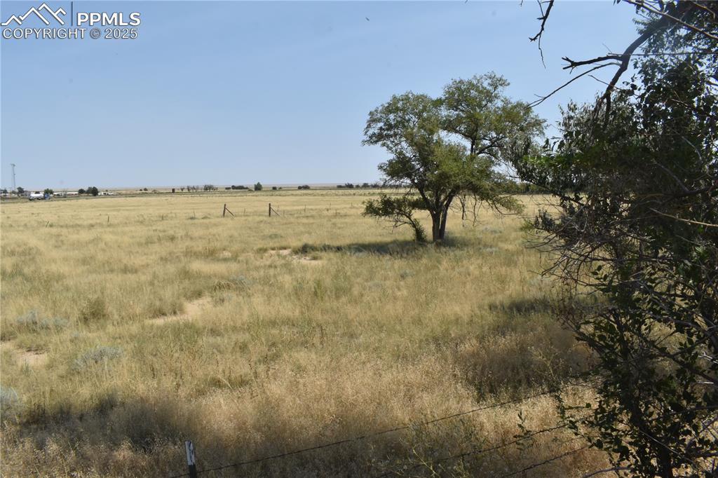 Image 46 of 47: View of undeveloped land with rural landscape