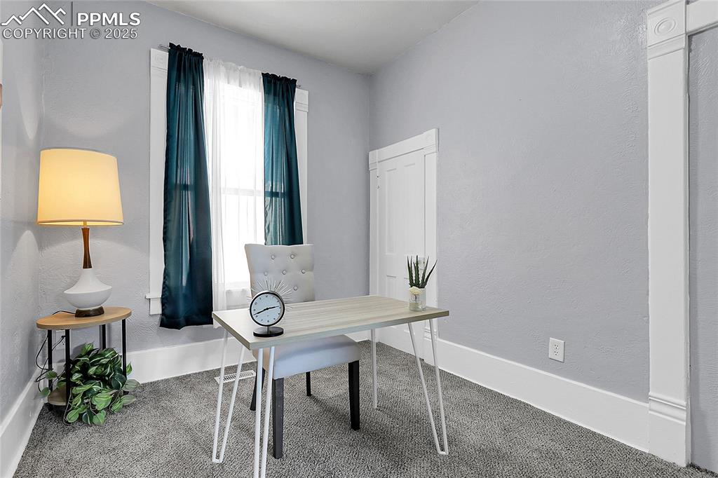 Image 11 of 29: Carpeted Bedroom