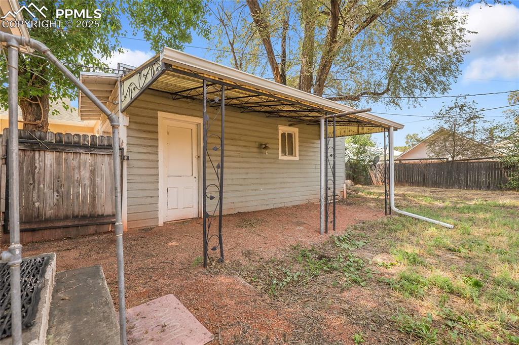 Image 26 of 29: Side View of Garage